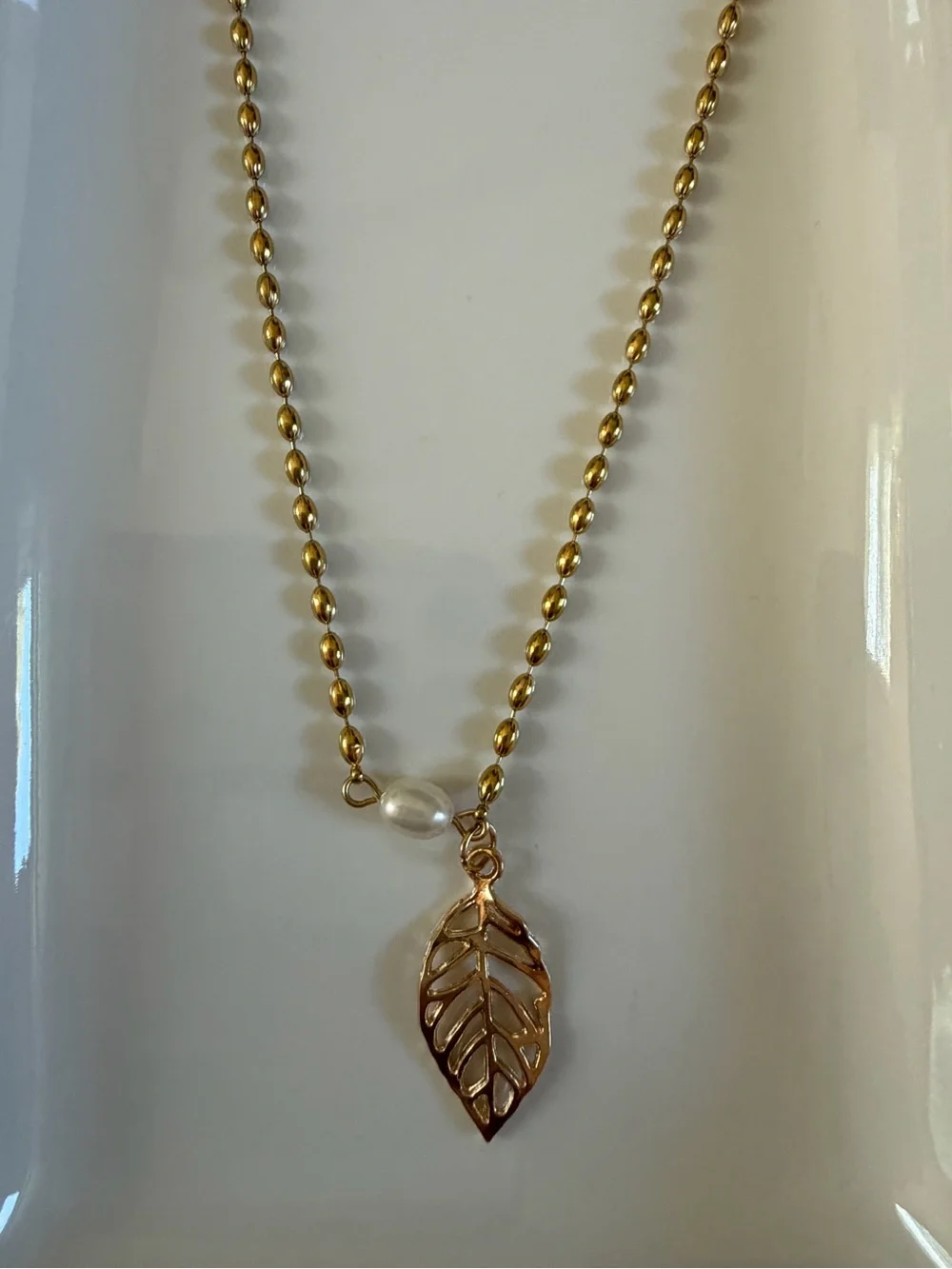 Gold Leaf Pendant Necklace with Pearl Accent